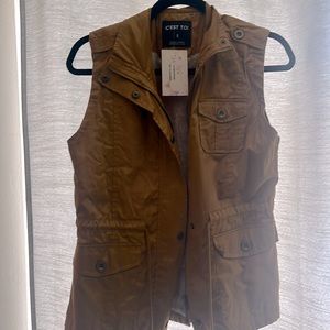 NWT boutique vest, lined with faux fur